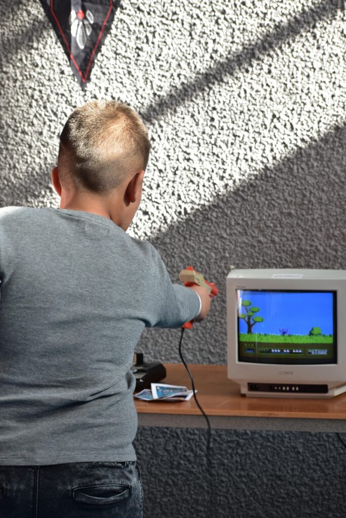 Retro gaming on Nintendo Entertainment System NES on a small portable CRT Sony television
